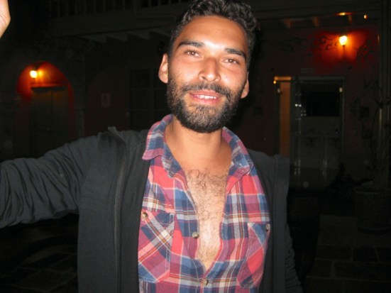 Aussie at Ecopackers with WAY too many buttons undone.